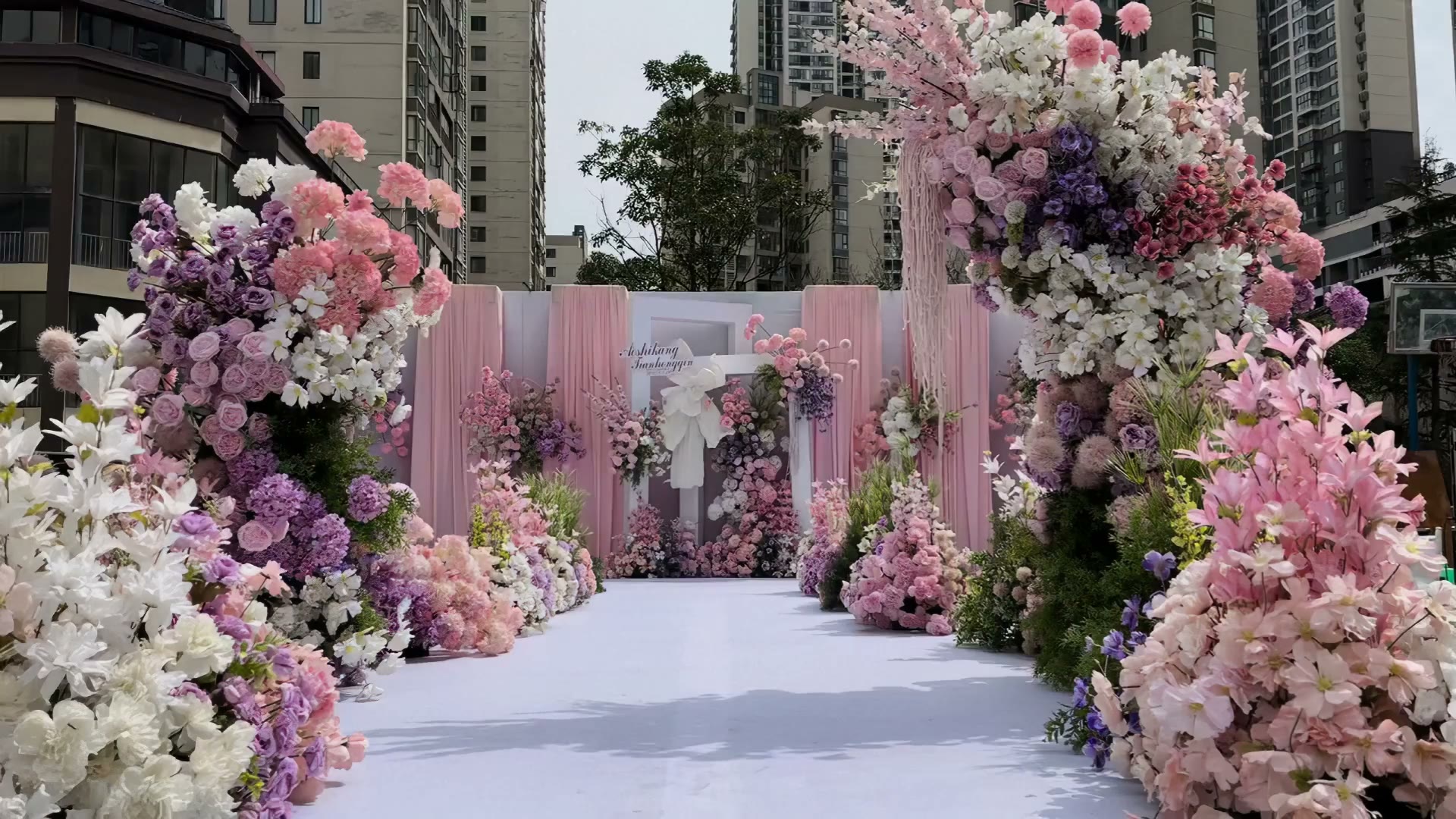 粉紫色户外韩式布幔纸艺婚礼
